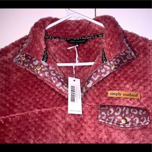 Selling a Simply Southern pull over. Color is a Pinkish Maroon. Size Large